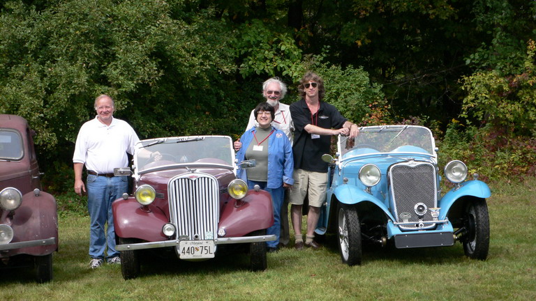 More mugs, and wow, a girl in there too.   What can we say... the chicks dig the cars.  Well done Gene.