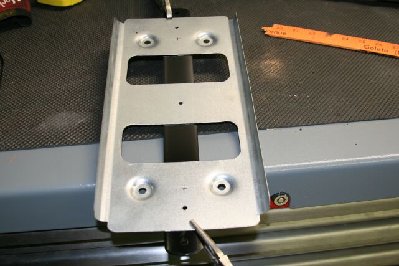 Since I do not have a spot welder and the original was spot welded, I replicated the look by drilling a 1/4&amp;quot; hole in the sheet metal tray and then hitting it with the TIG.  It looks kind of spot welded.