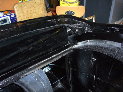Picture 1 showing the inside corner behind the rear seat back. Detail photos of this area would be very helpful.